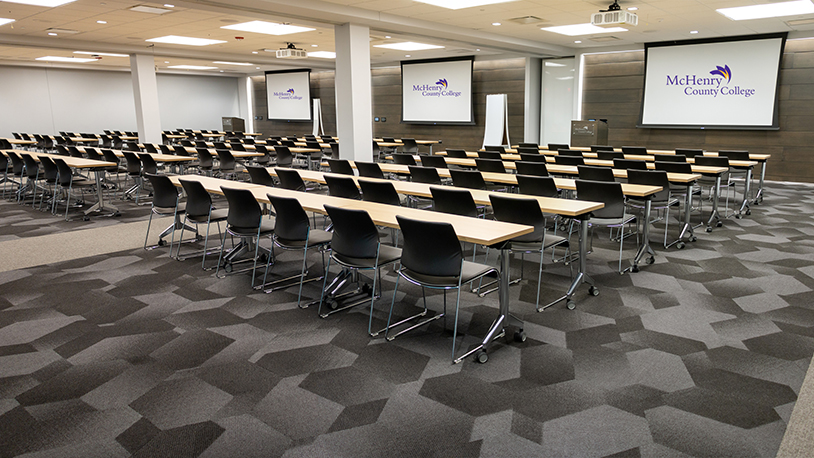 photo of large Conference Center with projectors